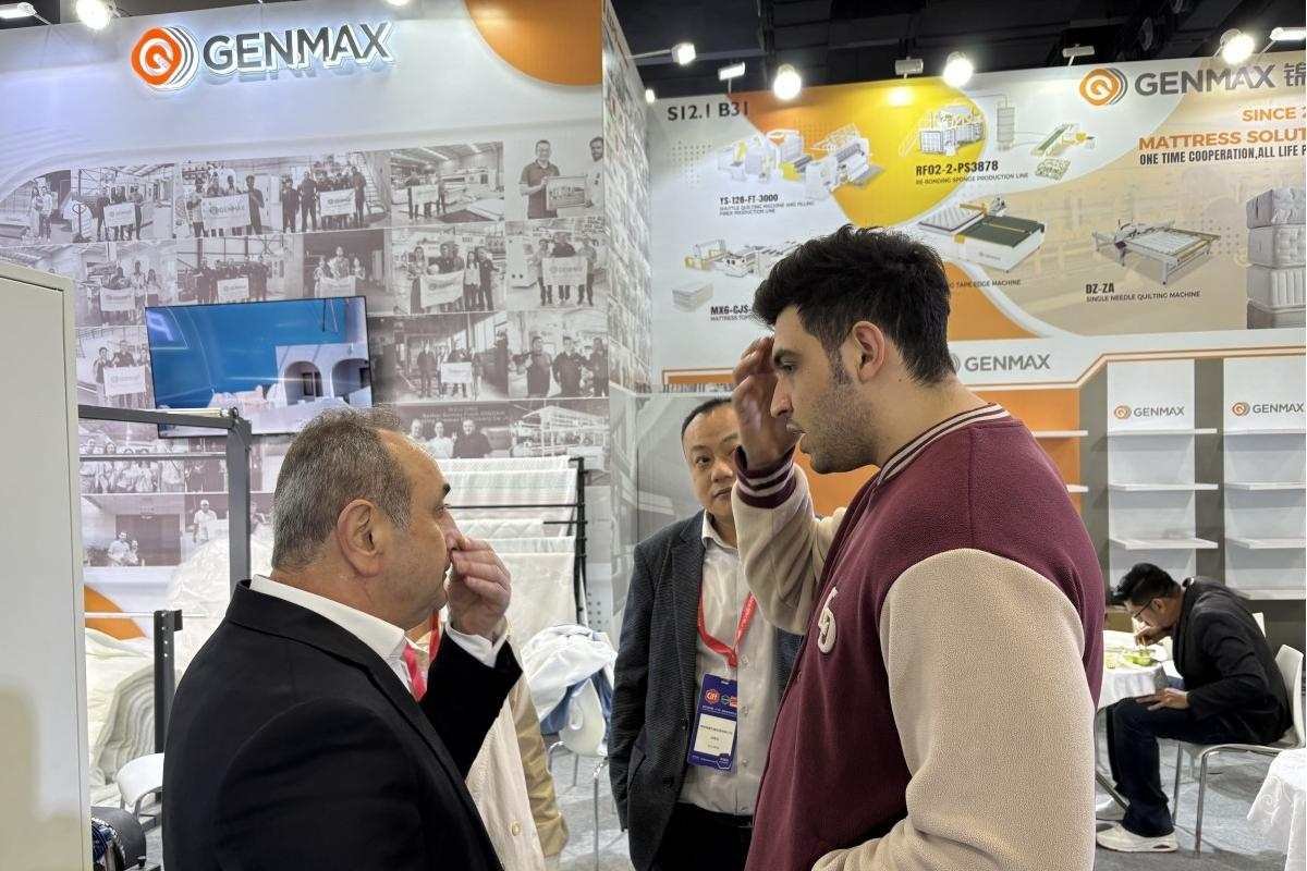 Group photo of GENMAX team and customer marking a memorable meeting at the CIFF booth.