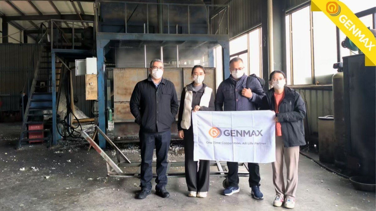Sales team and visiting Moroccan customers posing for a commemorative group photograph at the foam recycling machinery factory entrance following their comprehensive facility tour.